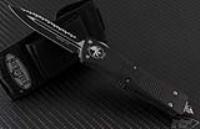 (#138-3) Microtech Troodon - D/E - Black - Full Top Serrations